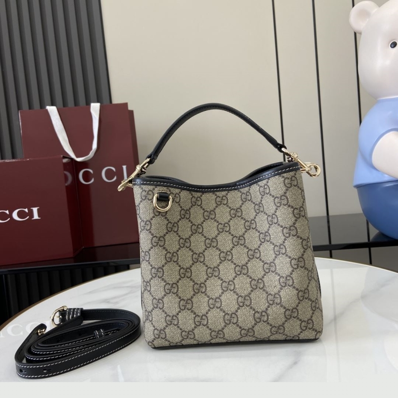 G*u*i top handle bags
